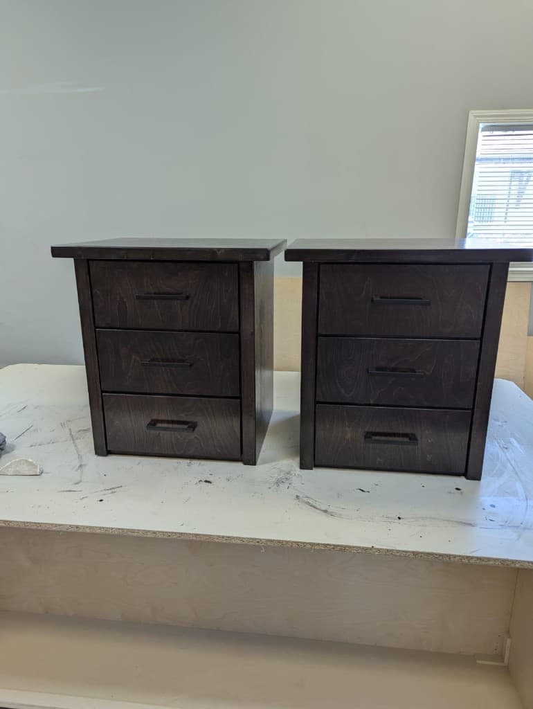 Matching pair of custom nightstands built to complement a custom box bed