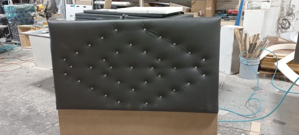 Custom tufted headboard with crystal button detailing, built in our workshop