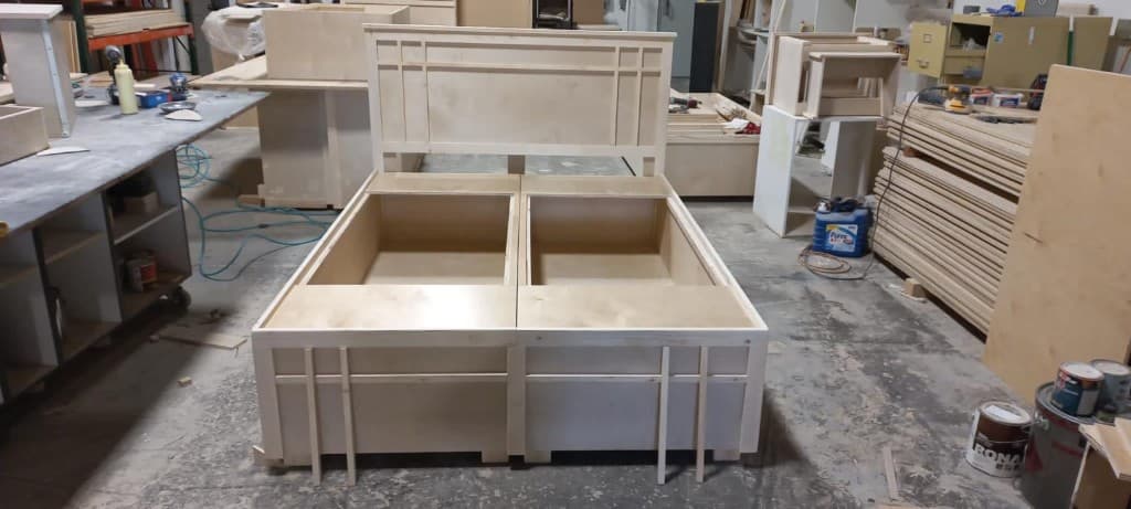 Craftsman-style custom box bed frame under construction in our workshop
