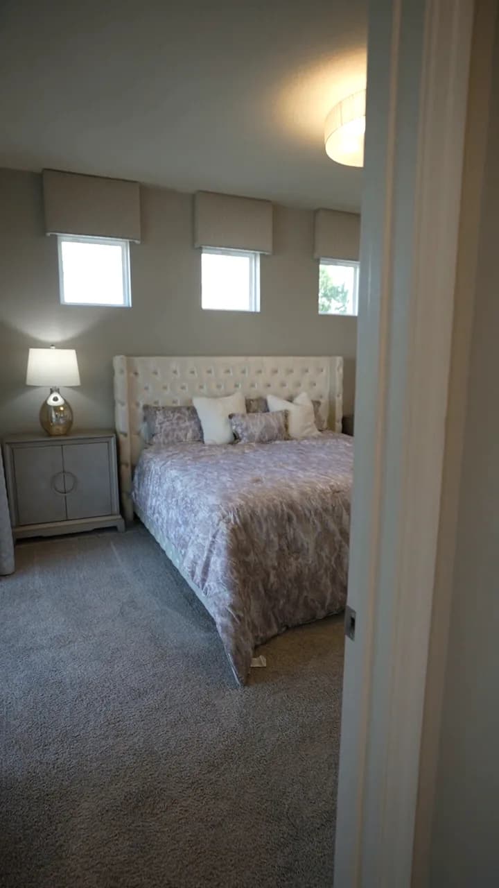 Custom box bed with hydraulic storage, matching nightstands and headboard built by Home Solutions Edmonton